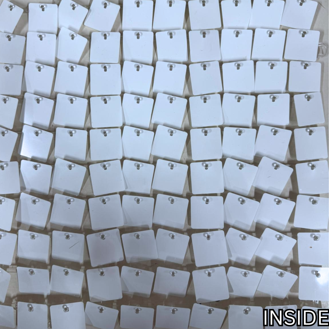 matte white sequin panels shimmer wall